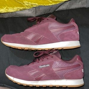 Maroon Reebok sneakers